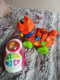 Zabawka grająca i jeżdżąca dla niemowlaka telefon i tygrysek