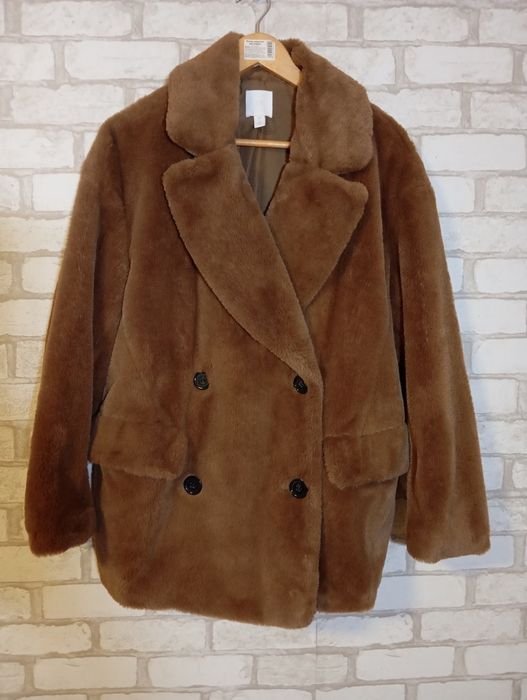 Кожушок зі штучного хутра колір кава з молоком. 46-48