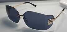 Okulary damskie Miu Miu