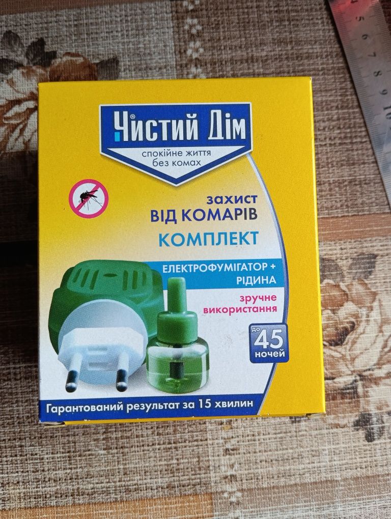 фумігатор з рідиною від комарів