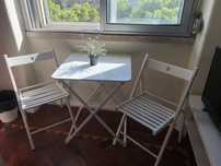 Mesa de jardim com cadeiras