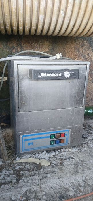 Máquina de café e Máquina de lavar chavenas