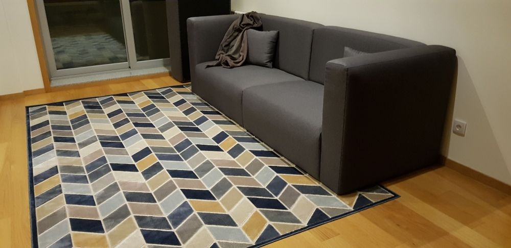 Sofá de 3 lugares com puff amovível