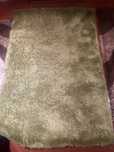 Carpetes verde e bordo