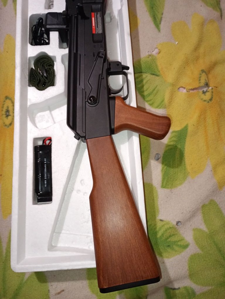 Игрушка автомат .