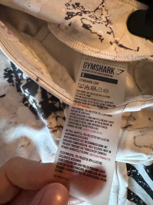 Białe marmurkowe legginsy gymshark S
