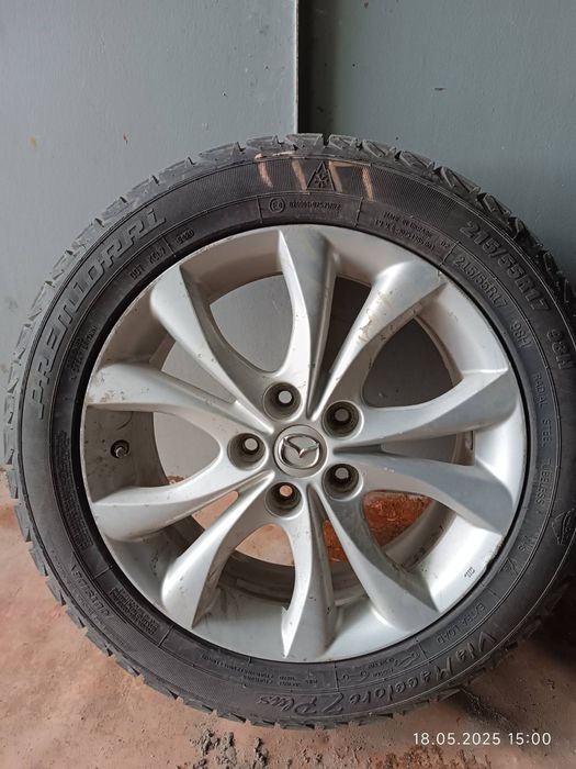 Диски з гумою mazda