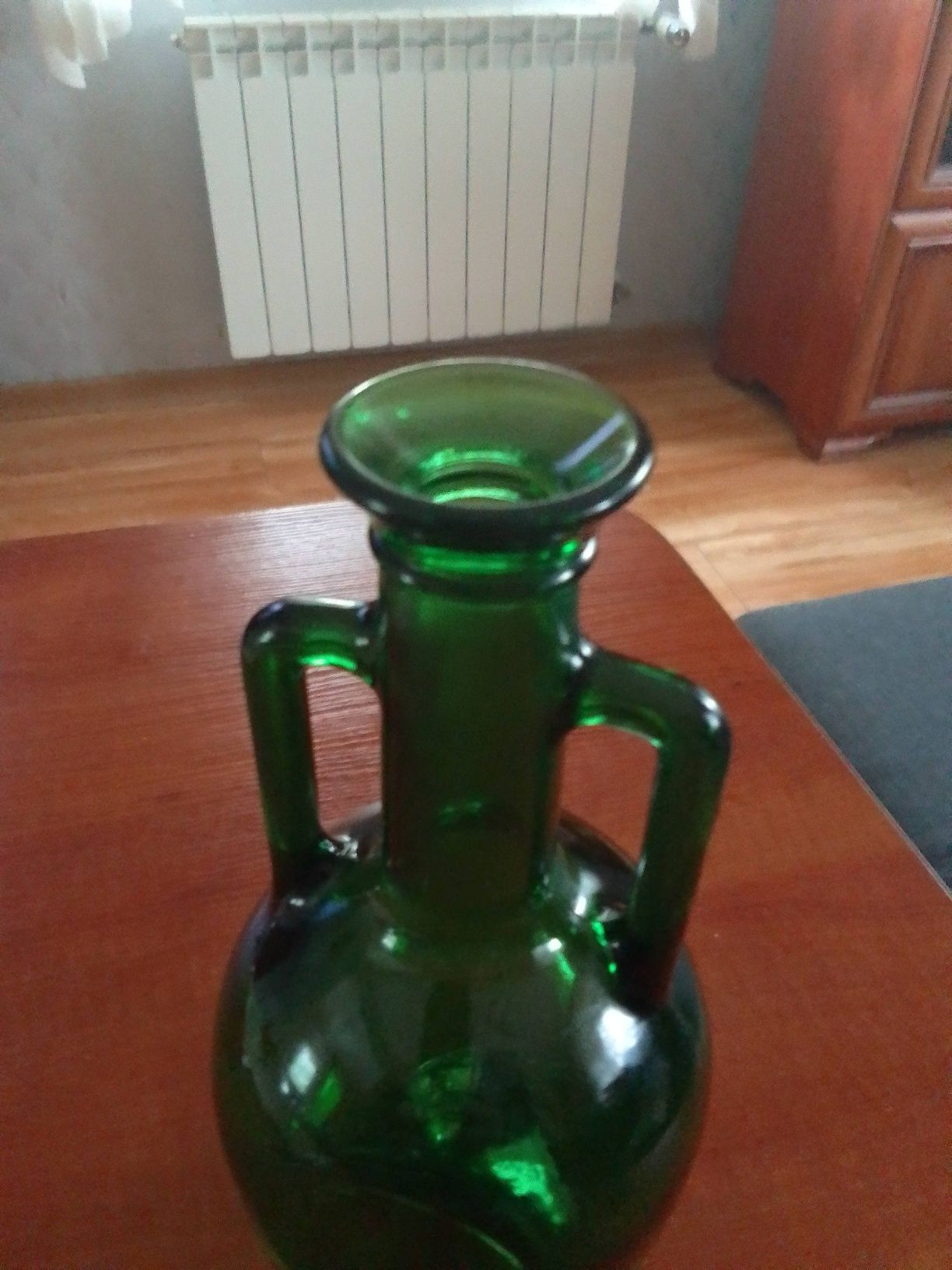 Zielona butelka z uszami