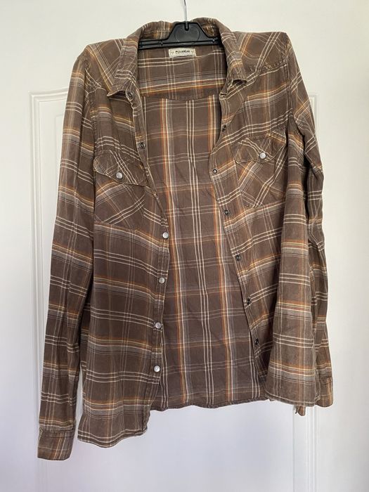 Várias camisas de vários tamanhos