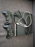 PlayStation 3 320GB + 7 gier + 2 pady