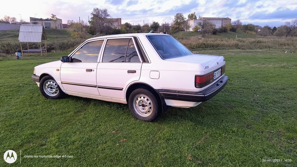 Продам Мазду 323.