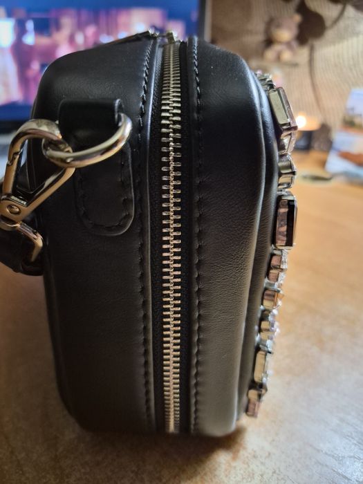 Продам кожаный дамский клатч.