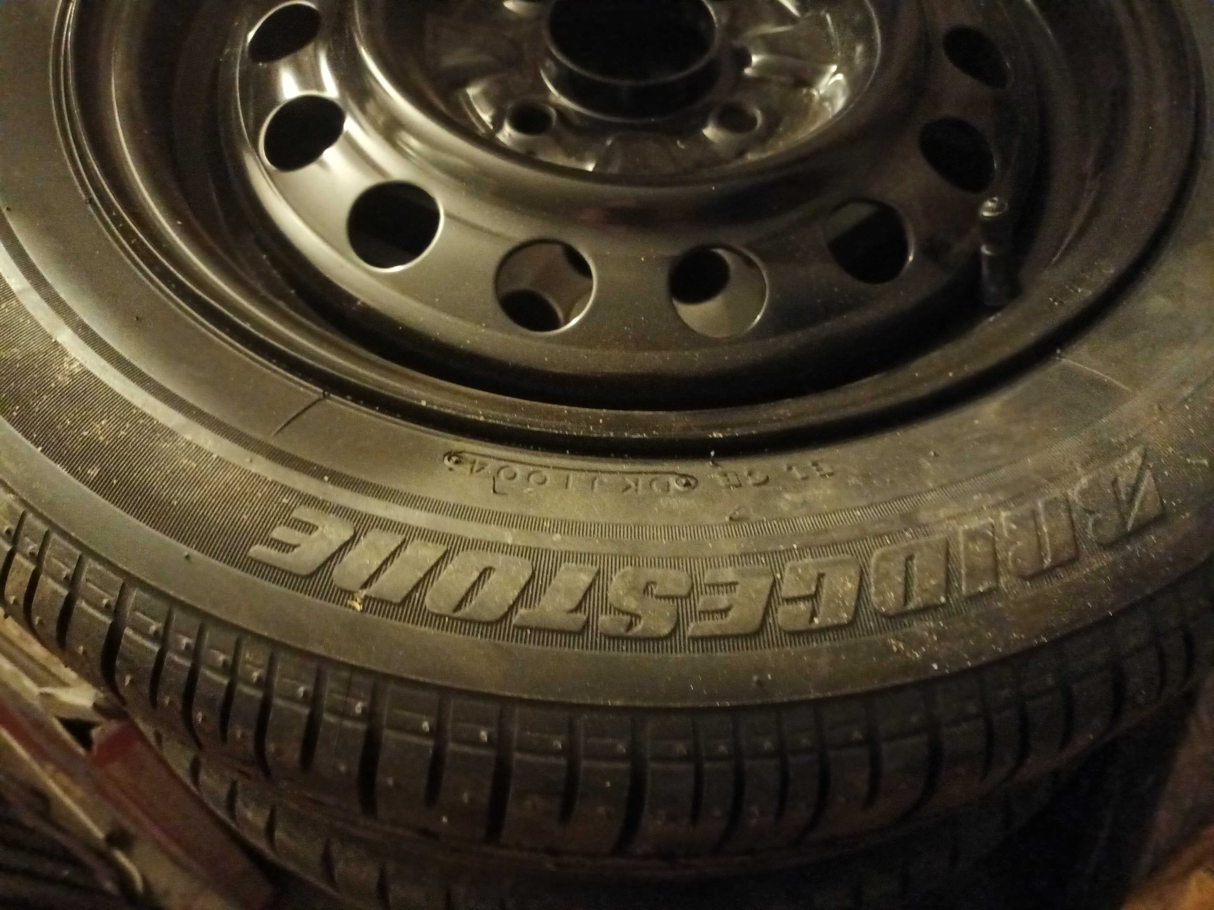 Opona z felgą zapas Lancer 2003r 4 śruby Bridgeston Turanza 195/60 R15