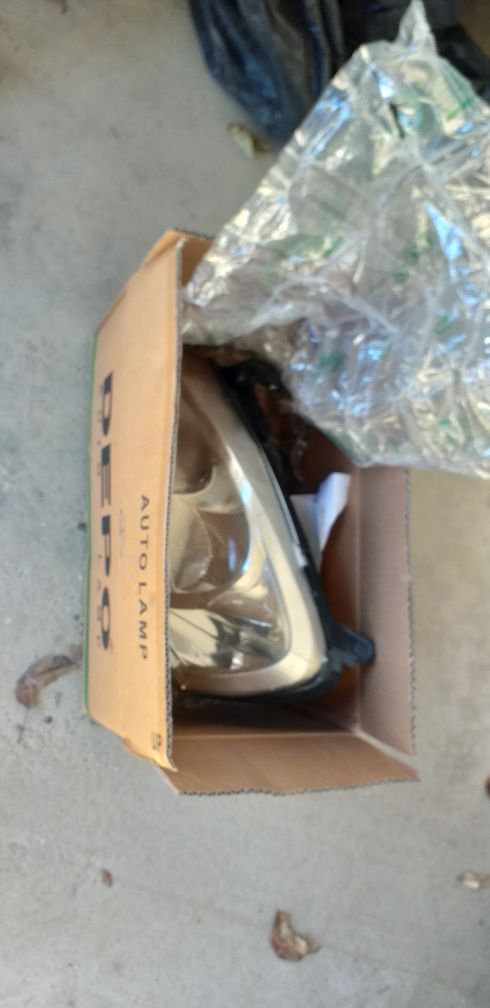 Farol esquerdo Opel  Corsa 1.3 CDTI