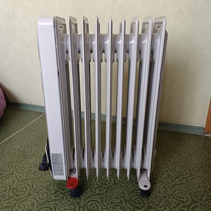 Масляный обогреватель De'Longhi