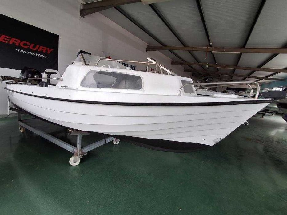 Barco OBE 4.70 com o motor TOHATSU 25HP  com trime 4T.