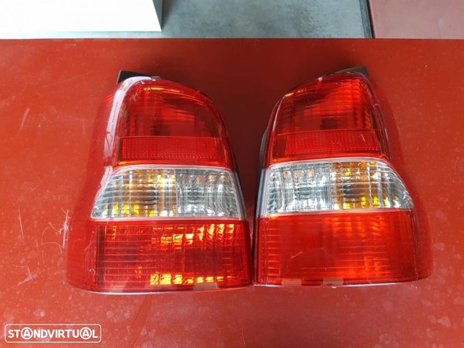 Farolins Mazda Demio 2003