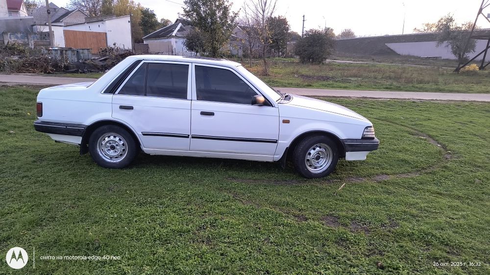 Продам Мазду 323.