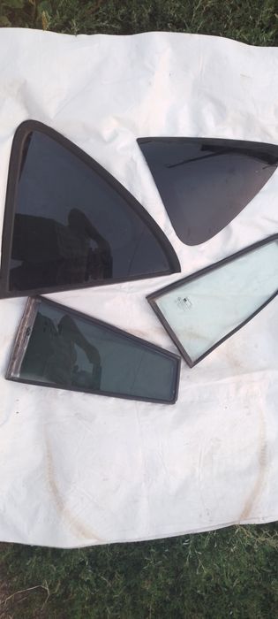 Стекла дверей и кузова Санг -Енг