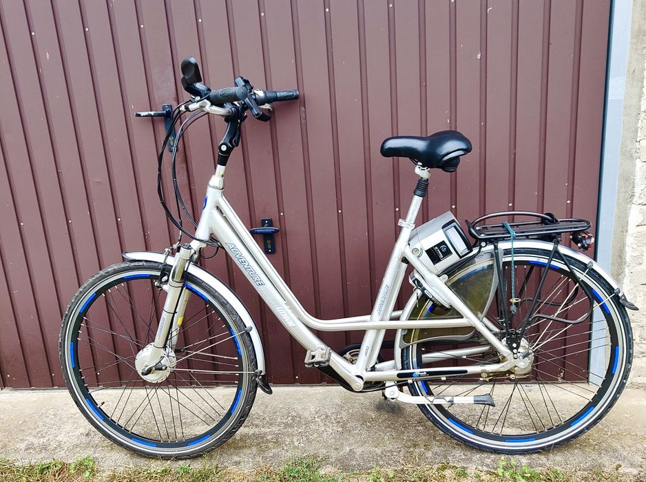 Rower Adventure trekkingowy elektryczny jak Cube Giant Kellys Hibike