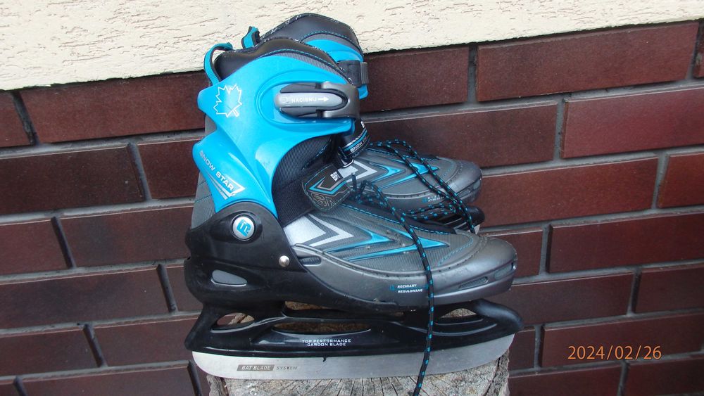 Buty zimowe z łyżwami regulowane od 34 do 37.