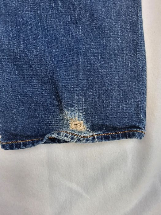 Guess - męskie spodnie jeansowe z dziurami i przetarciami