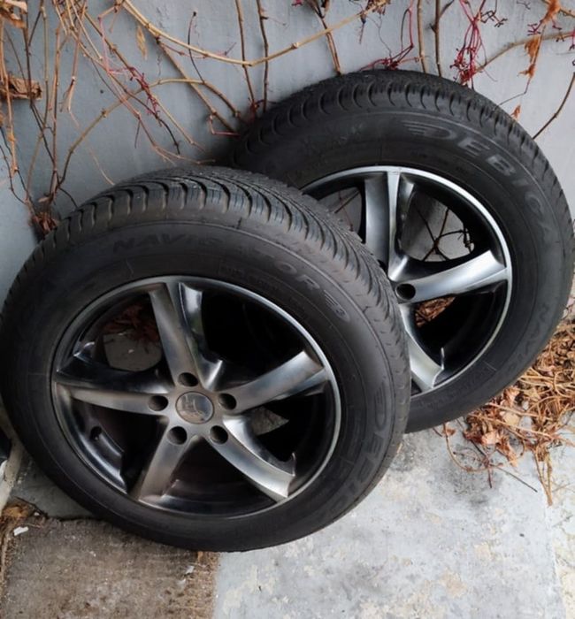 Komplet felg aluminiowych z oponami wielosezonowymi