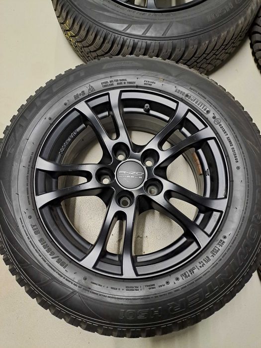 Czarne alufelgi Anzio 5x114.3 i opony zimowe Falken 195/65R15 91T