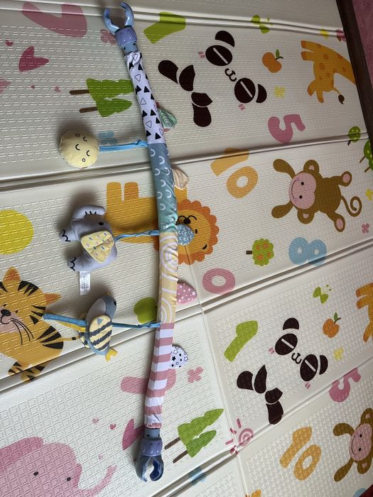 Дуга брязкальце на коляску