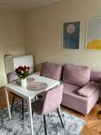 Sofa 193x92cm z funkcja spania i skrzynią + stół i dwa krzesła