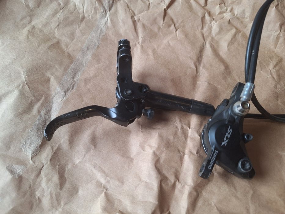 Hamulec shimano m7000 przód lewy