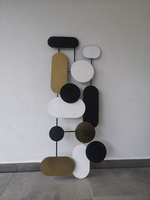 Peça decorativa em metal