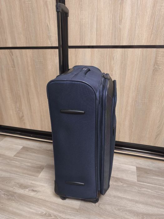 Чемодан бошьшого размера на колесах, валіза для подорожей тканина