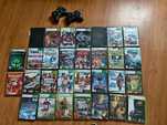 30 дисків та 2 джойстика від Xbox 360