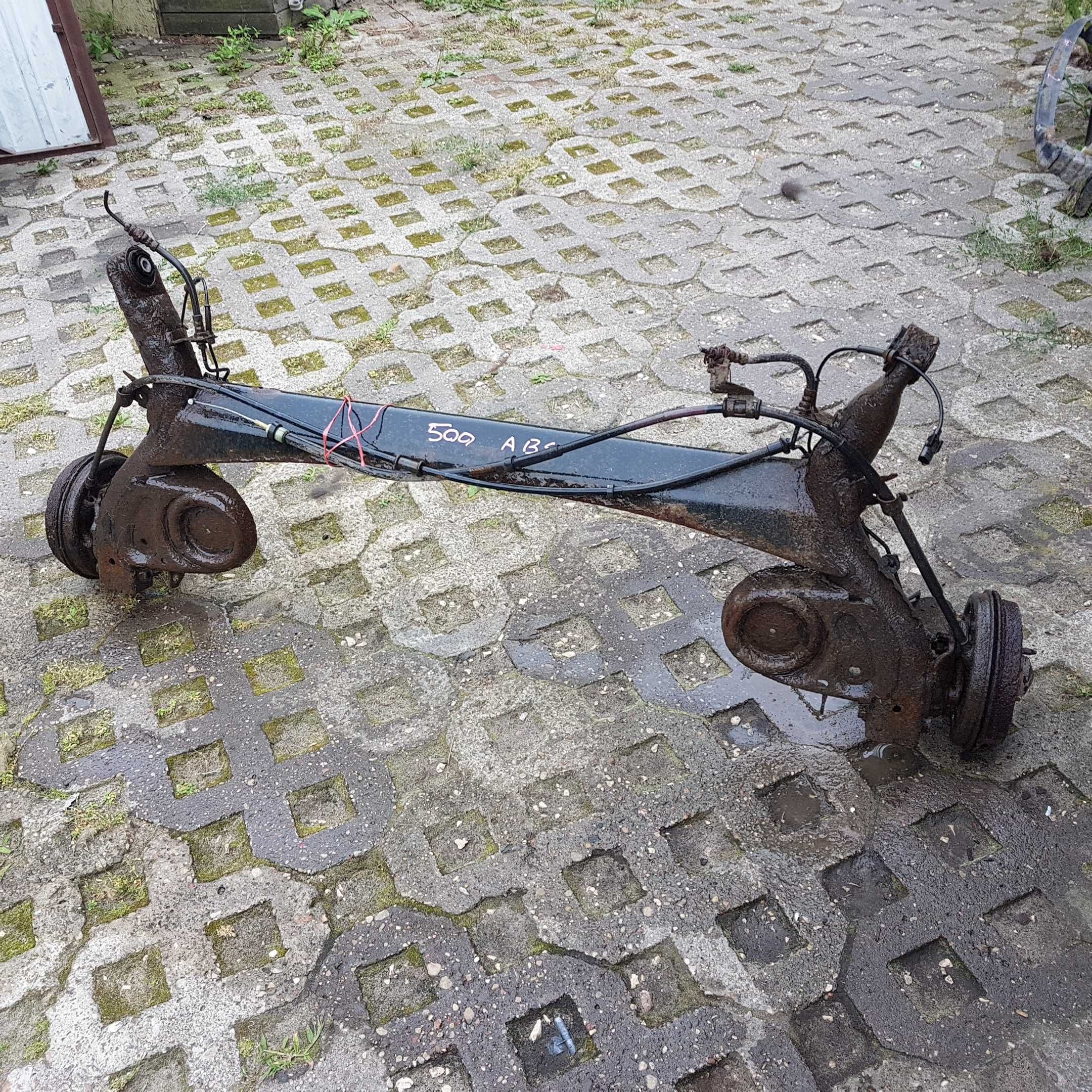 uchwyt ucho wspornik mocowania z belki tylnej fiat 500 ford ka panda