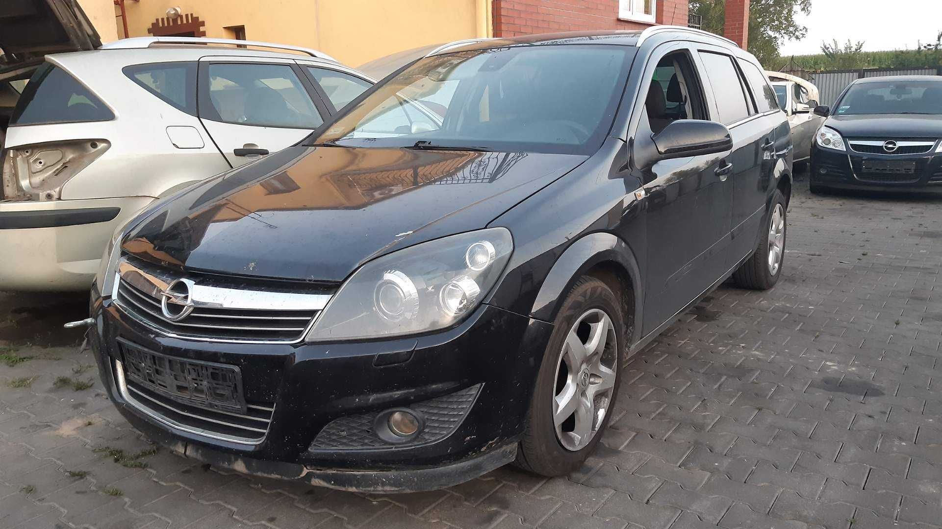 Astra H lift kombi Lampy bi-xenon zderzak maska klapa błotnik  Z20R