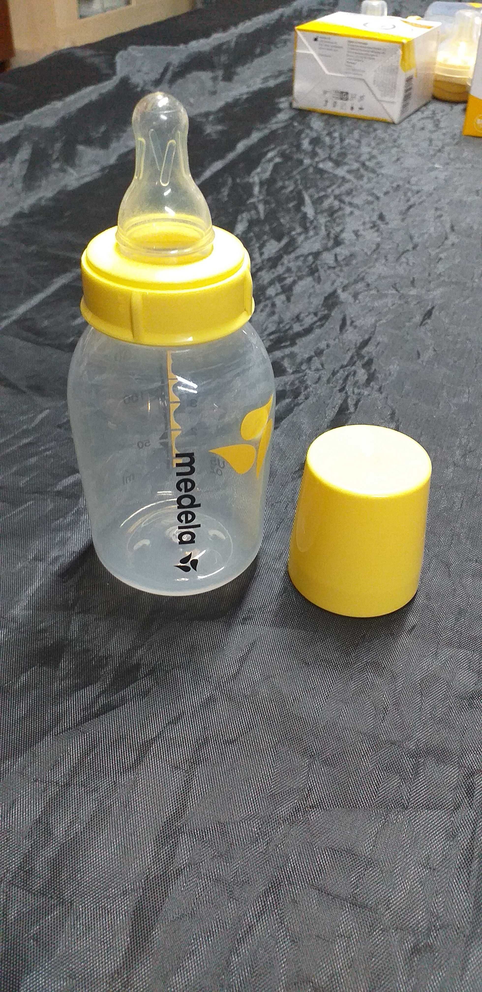 Vários biberões / frascos Medela 150ml e 250ml e tetinas Calma Medela