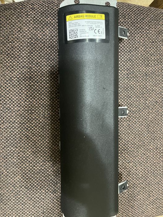 Подушка безпеки колін водія Polestar 2