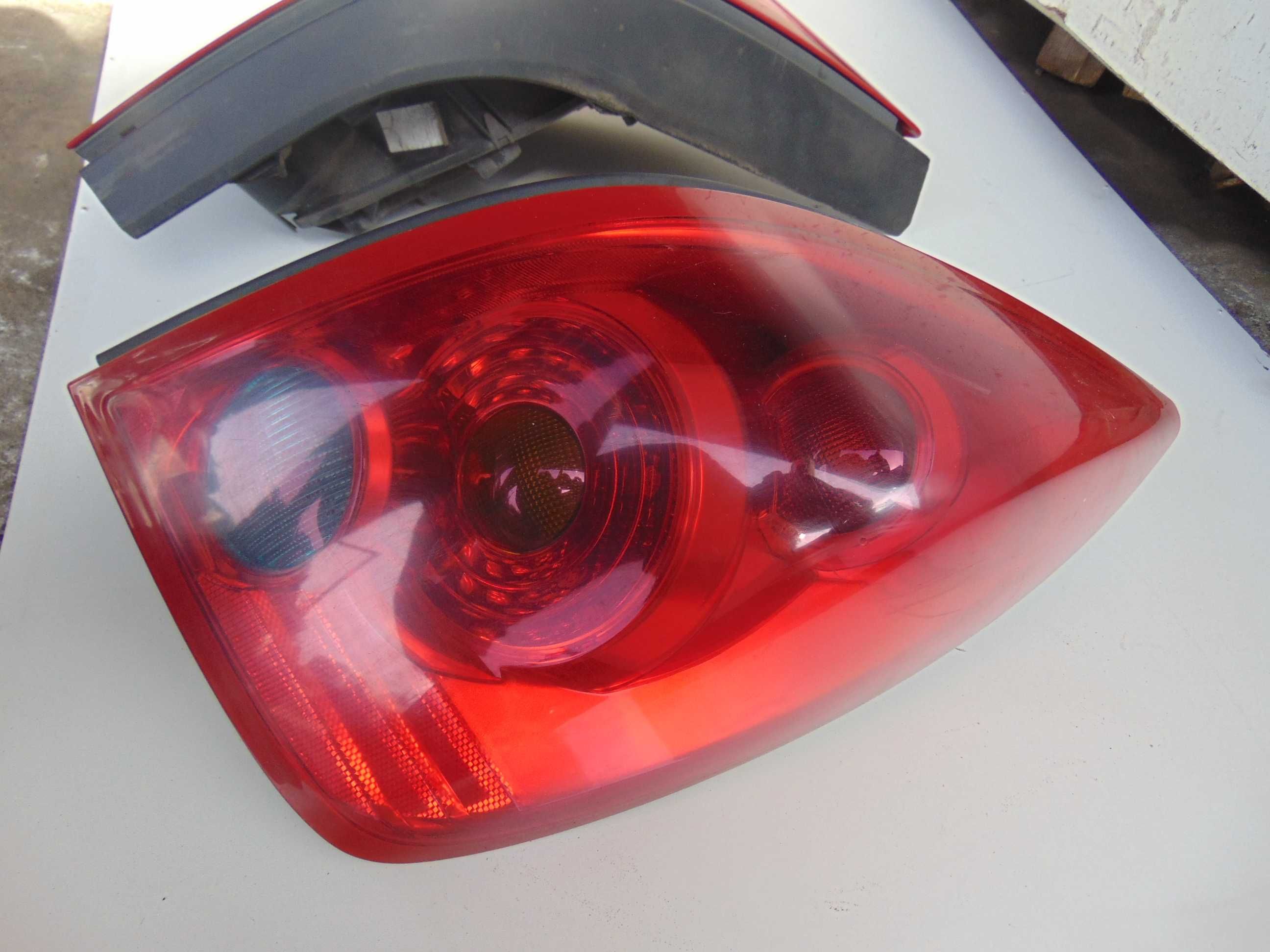 Lampa tył tylna lewa prawa Nissan Primera P12 HB