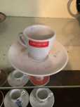 conjunto de chavena e pires de cafe com simbolo laranja