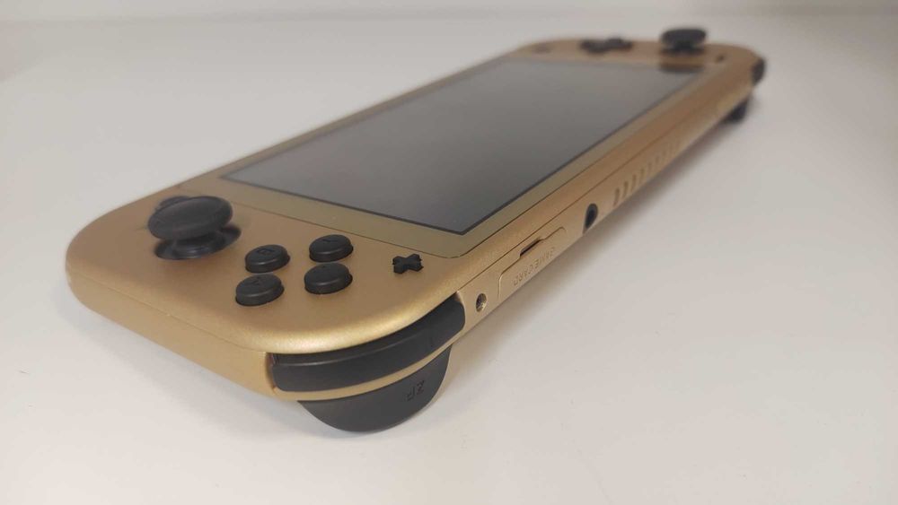 (BP) Nintendo Switch Lite Hyrule złota + Super Mario Bros + FC 25
