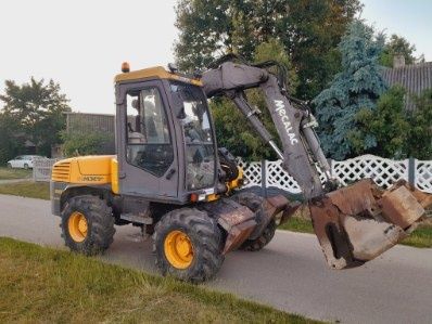 Koparko-Ładowarka MECALAC MXT12