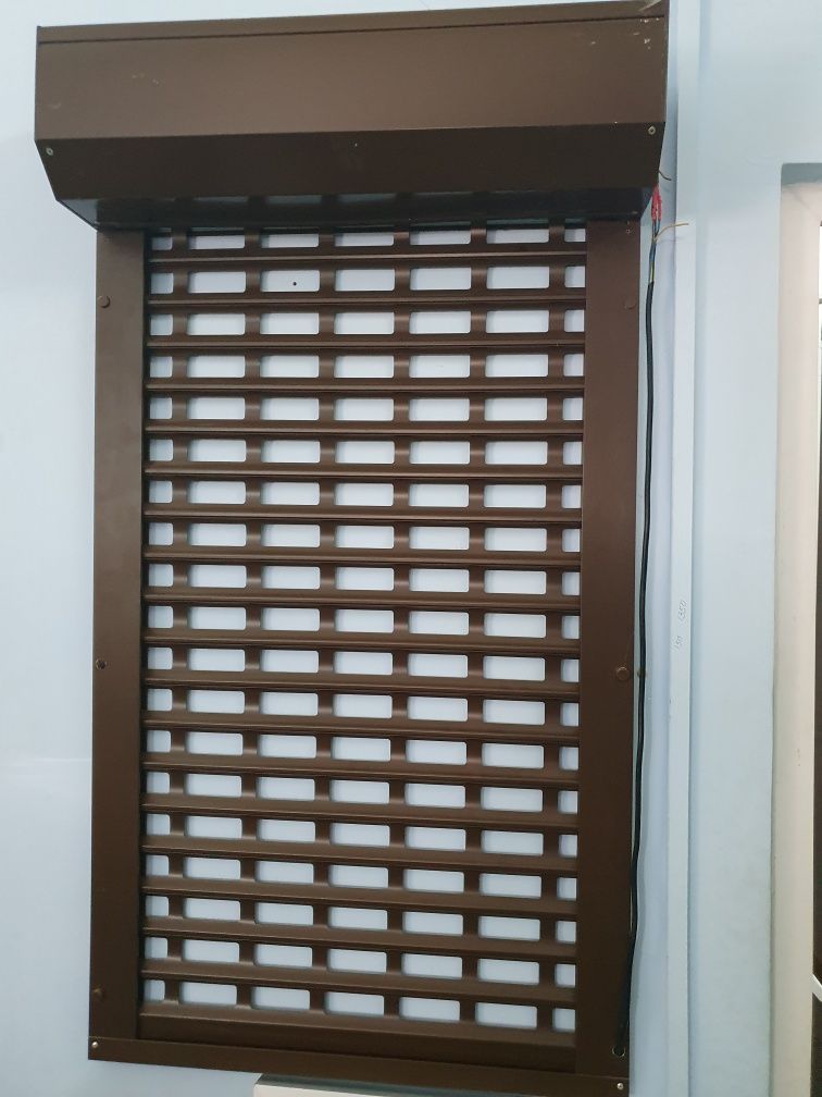 Ролетні ворота  ролети захистні екструдовані та решіткового типу