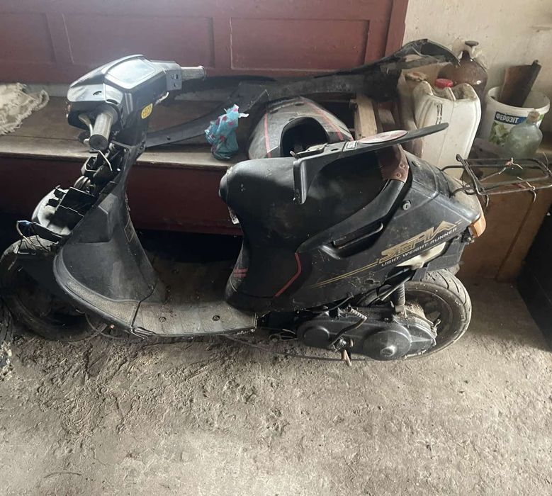 Скутер Suzuki, Сузукі