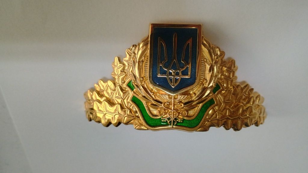 Значок - кокарда покрытия золотом