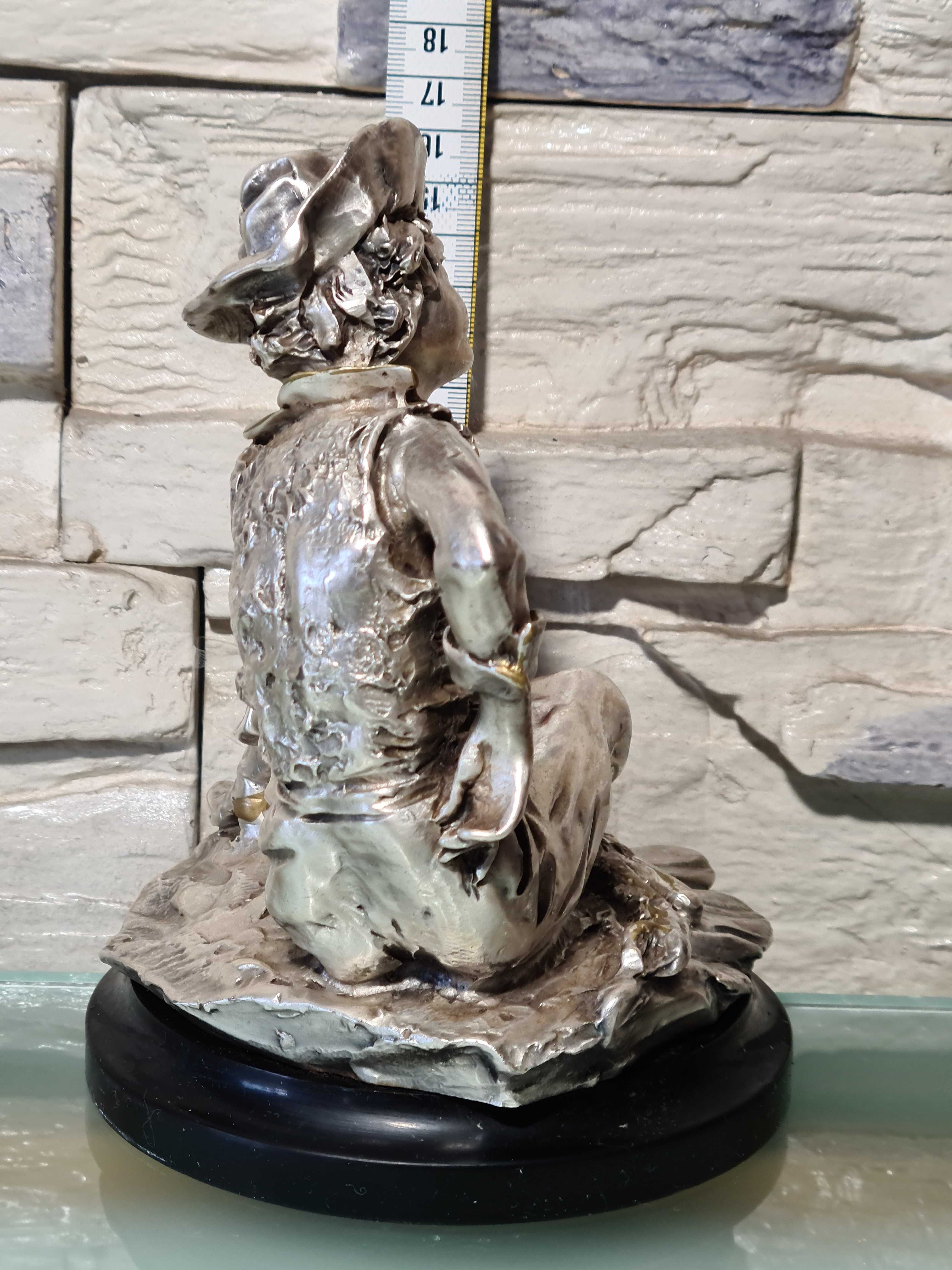 Estatua de prata laminada