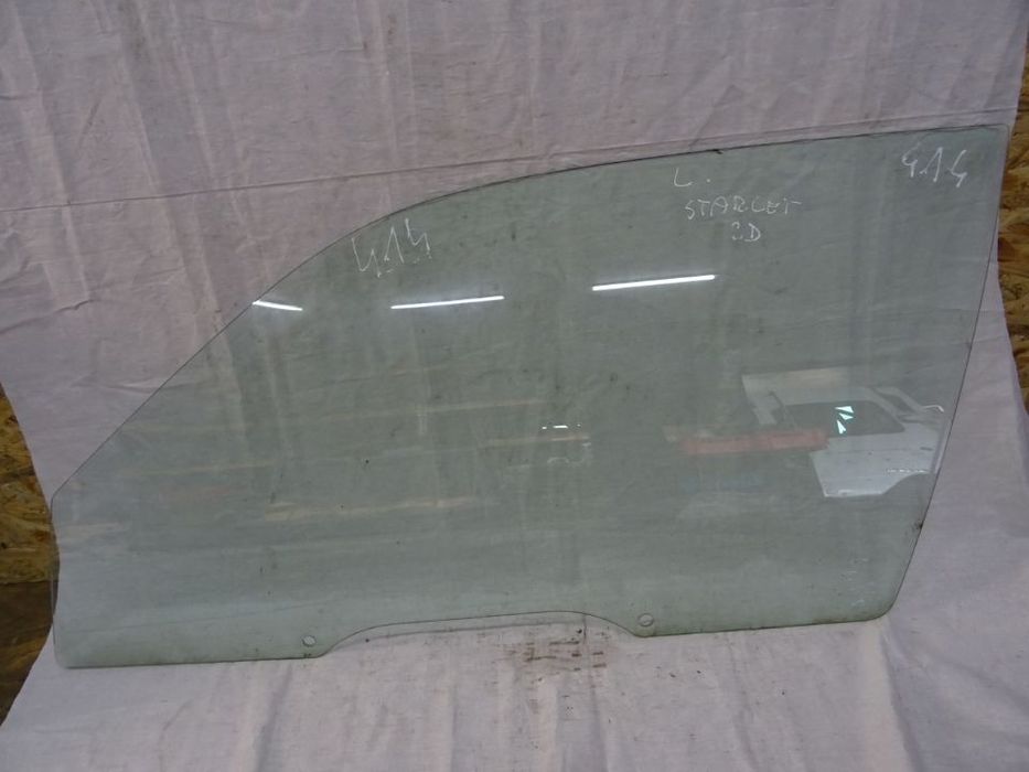 SZYBA BOCZNA DRZWI LEWA LEWY PRZÓD PRZEDNIA TOYOTA STARLET 96-99 NR414