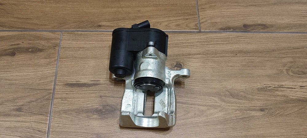 Супорт задній лівий на VW b6,B7,CC,Sharan,Tiguan Новий. 5N0 615 403