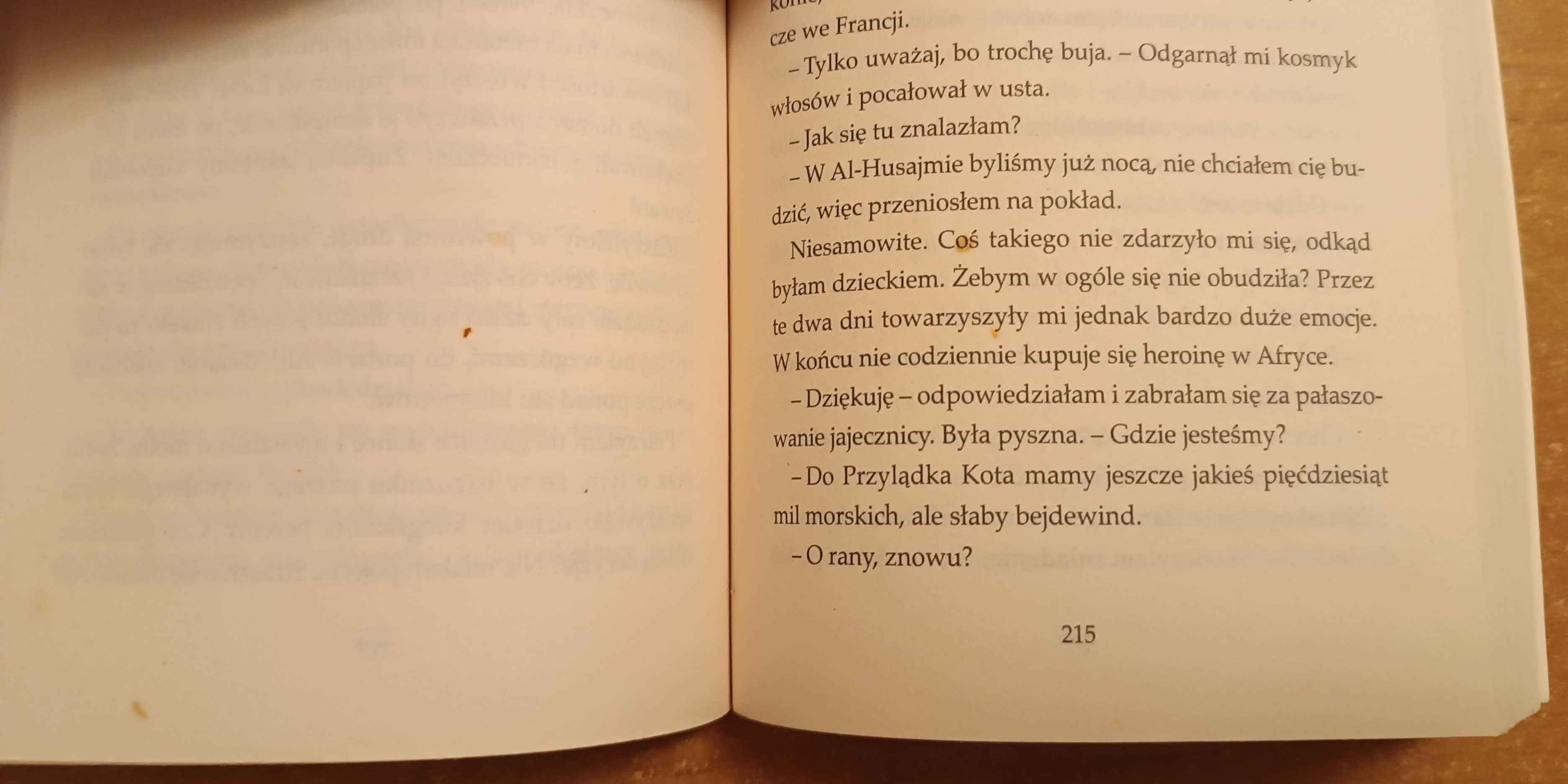Książka "Osaczona" Pola Roxa (uszkodzona)
