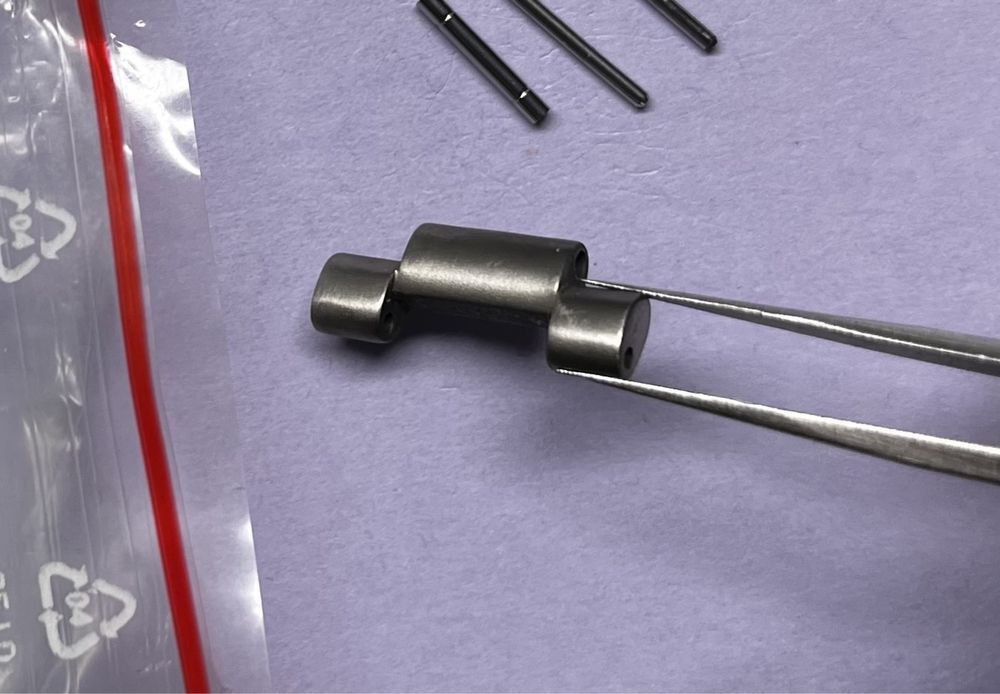 Omega 114TI1610 ogniwo tytanowe Seamaster